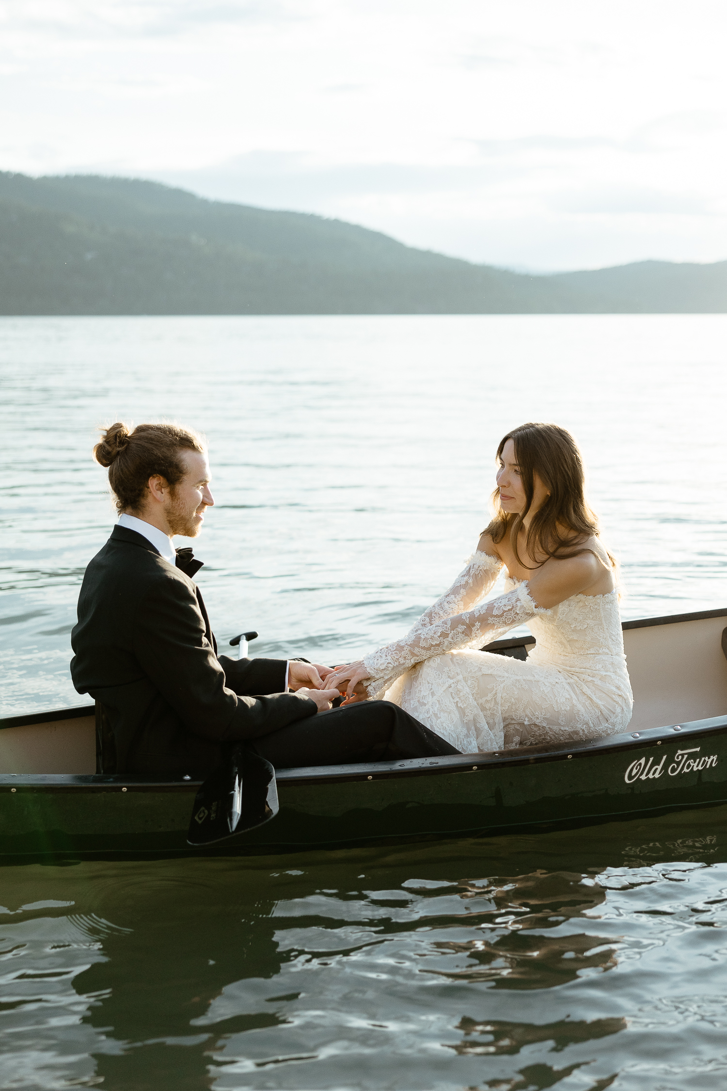 Couple on Whitefish Lake in Canoe in Montana